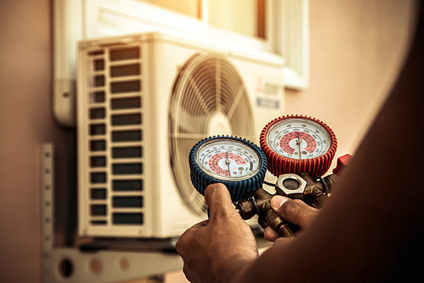 Professional Air Conditioning Service technician working in Townley, AL